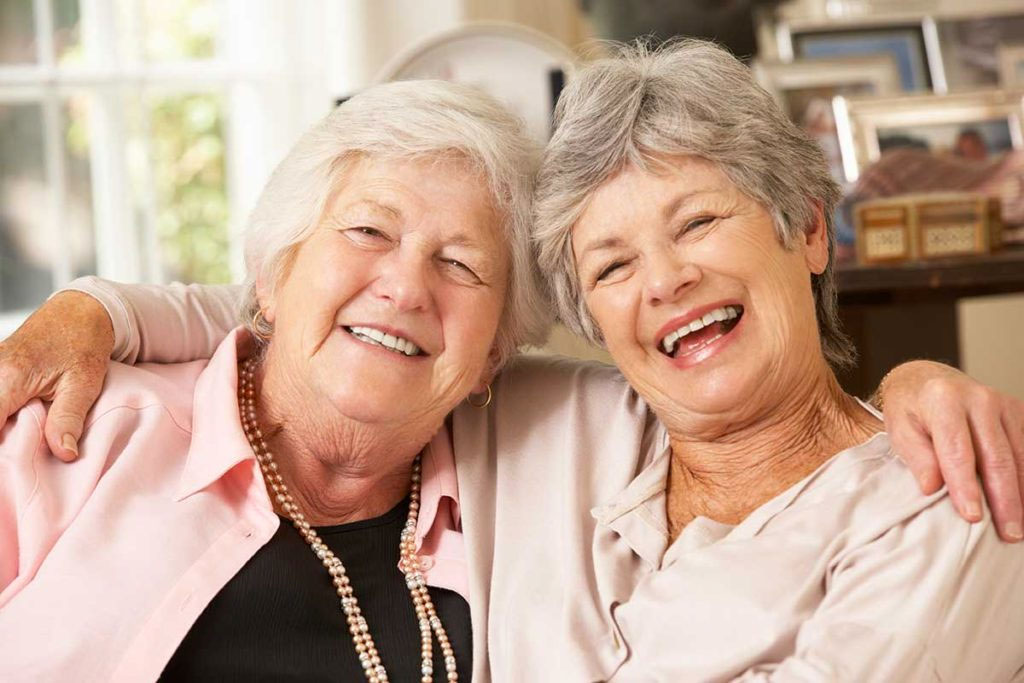 elderly women having fun with independent living at The Delaney at South Shore