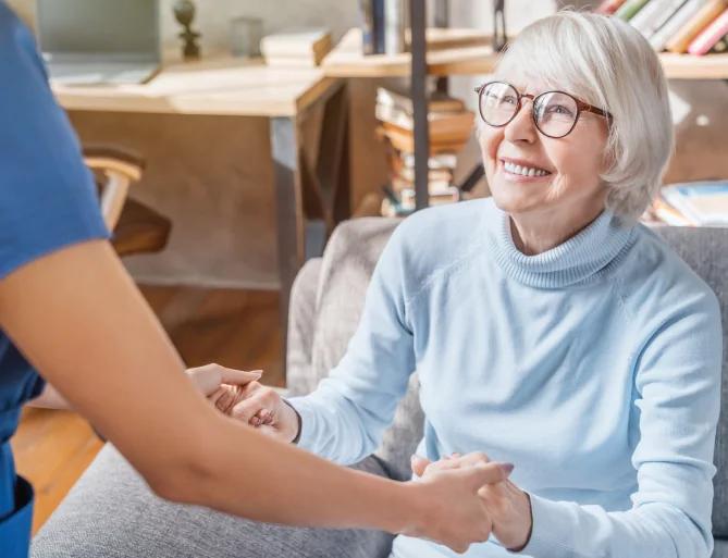staff helping senior